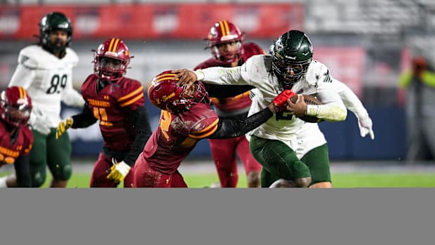 West Point tailback Kahnen Daniels (2) throws a stiff arm in the MHSAA Class 5A Football State Championship on Thursday, Nov. 30 at Vaught-Hemingway Stadium in Oxford, Miss.